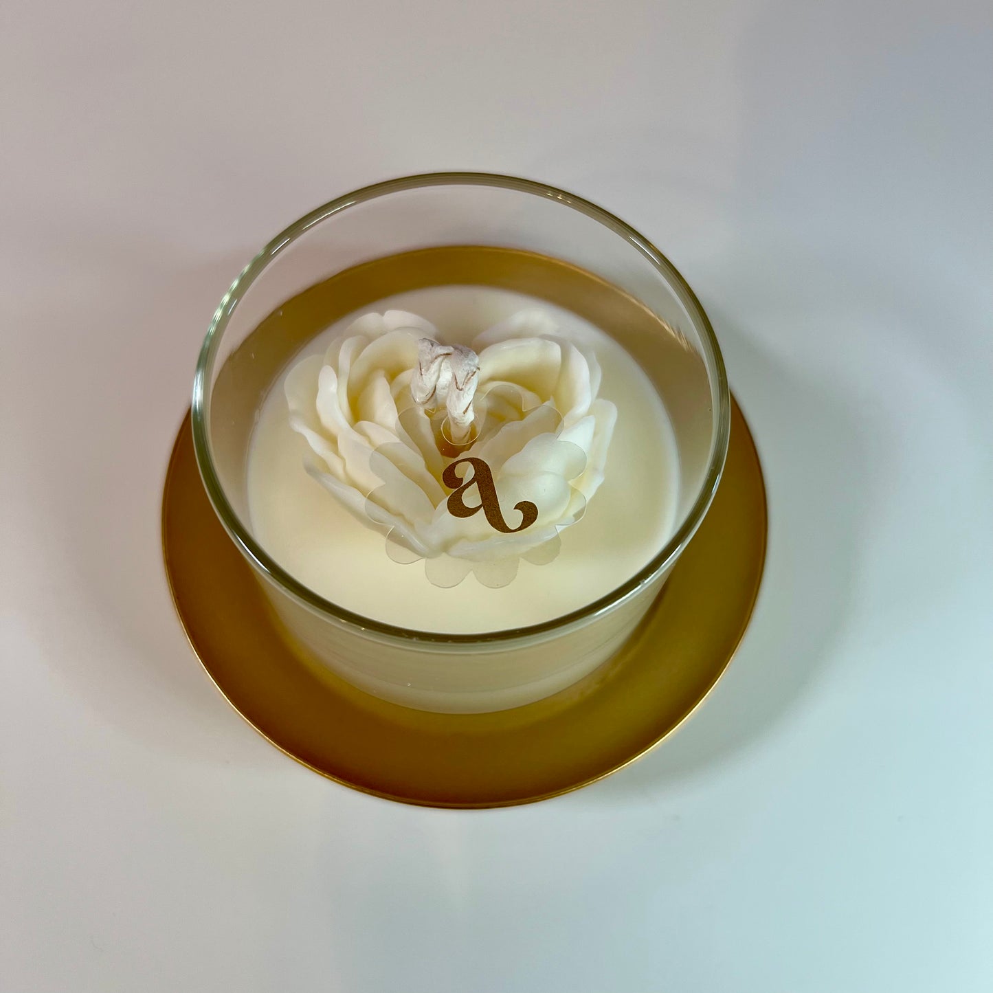 Vela aromática con flor de corazón